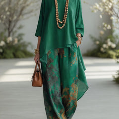 Green long tunic top and wide-leg printed pants set with flowy layered hems