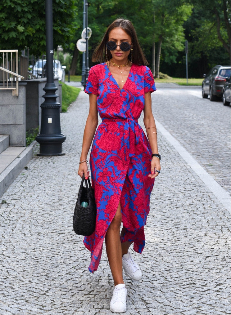 Blue and red floral wrap dress with short sleeves, V-neck, and waist tie
