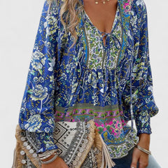 Blue floral peasant blouse with gathered neckline and long sleeves with elastic cuffs