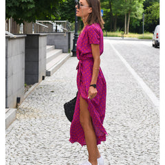Magenta dot print wrap dress with short sleeves and V-neck, belted waist