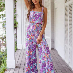 Purple floral wide-leg jumpsuit, sleeveless square neckline, ruched bodice, ankle length