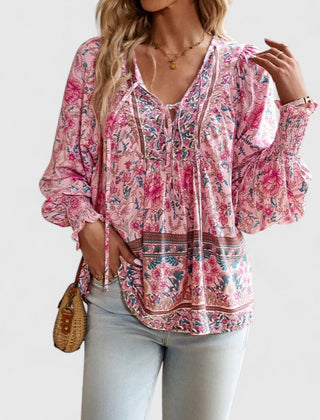 Pink floral peasant blouse with deep V neckline and billowy long sleeves