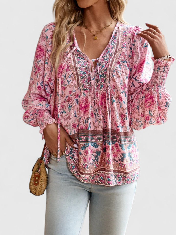 Pink floral peasant blouse with deep V neckline and billowy long sleeves