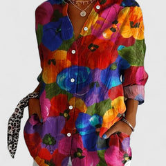 Bright multicolor abstract print blouse with button-front and long sleeves