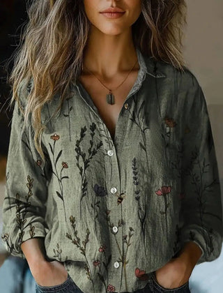 Olive green botanical button-up blouse with long sleeves and front buttons