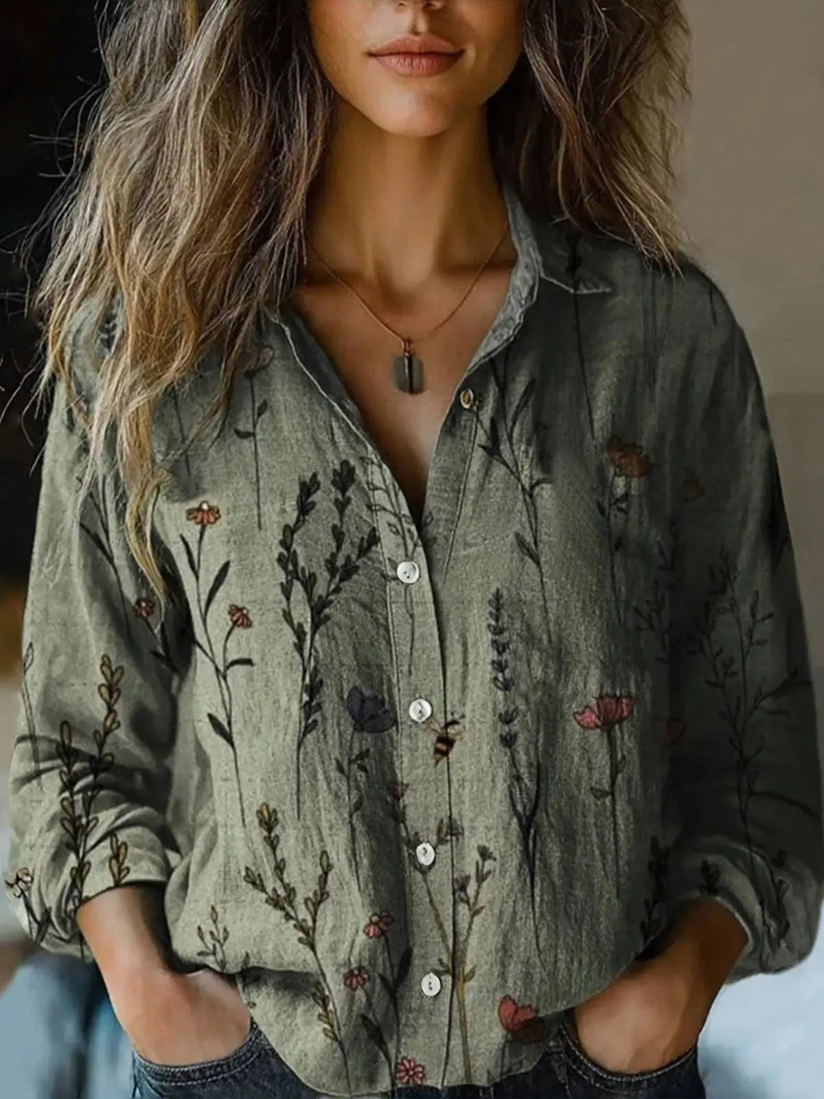 Olive green botanical button-up blouse with long sleeves and front buttons