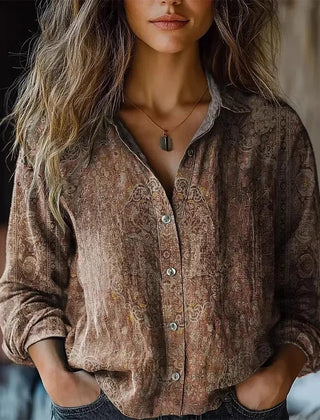 Brown and tan paisley button-up blouse with long sleeves and front buttons
