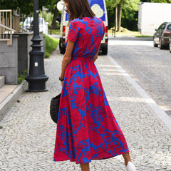 Blue and red floral wrap dress, short sleeves, V-neck with waist tie, side view