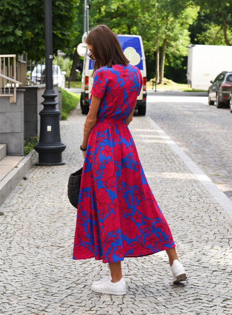 Blue and red floral wrap dress, short sleeves, V-neck with waist tie, side view