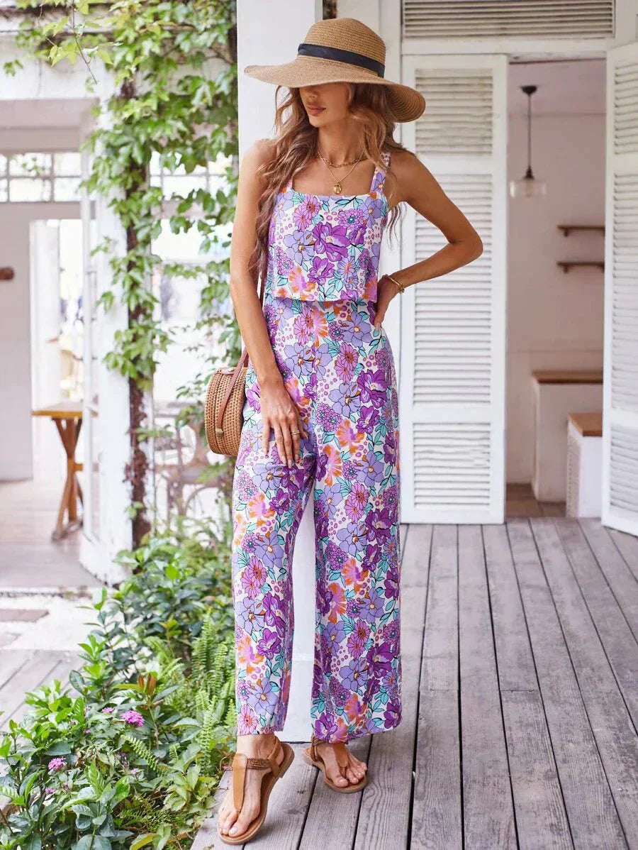 Purple floral wide-leg jumpsuit, sleeveless square neckline, thin straps, long wide legs