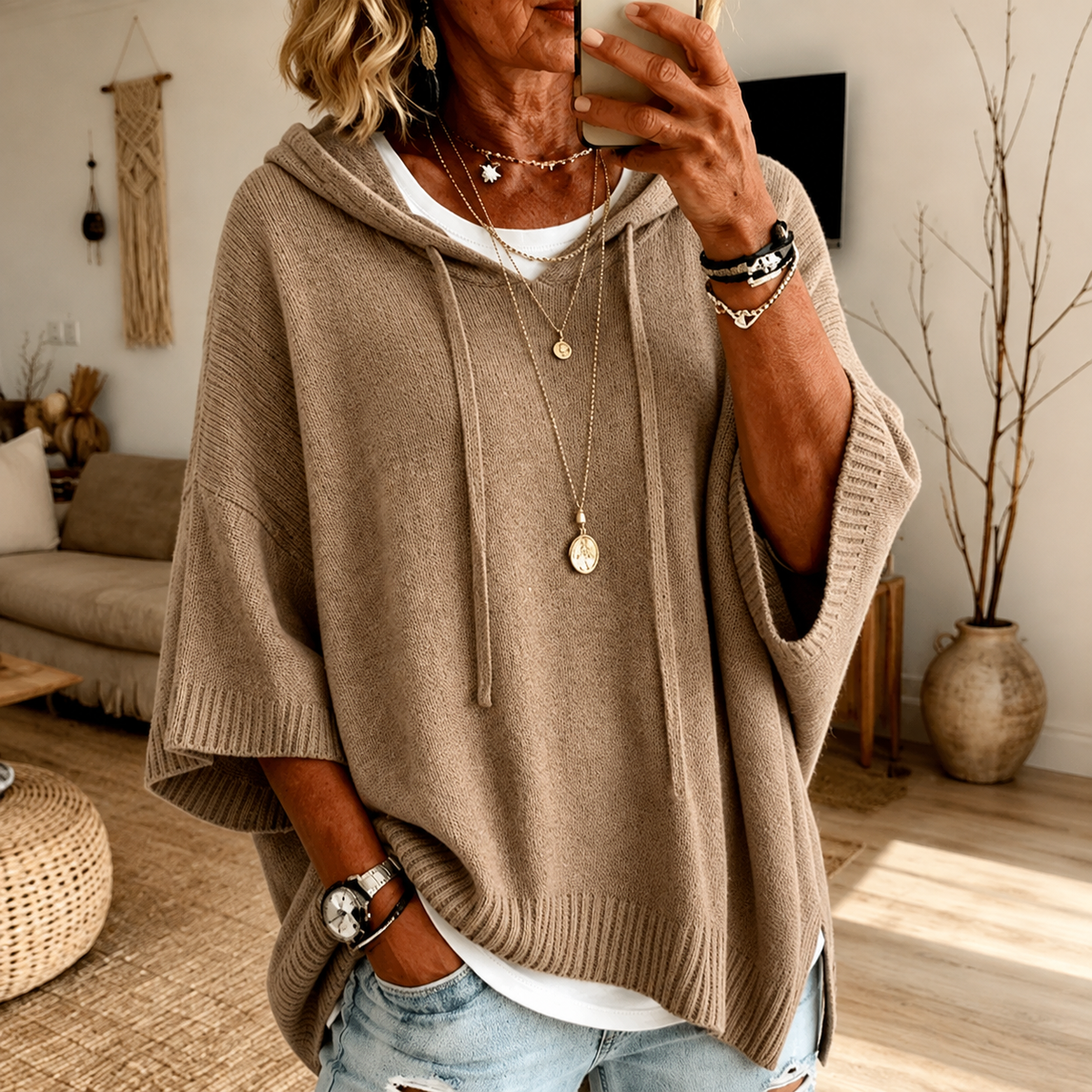 Taupe hooded knit poncho sweater with draped sleeves and ribbed hem