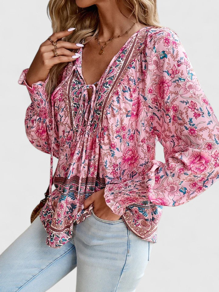 Pink floral peasant blouse with embroidered trim and gathered V-neck