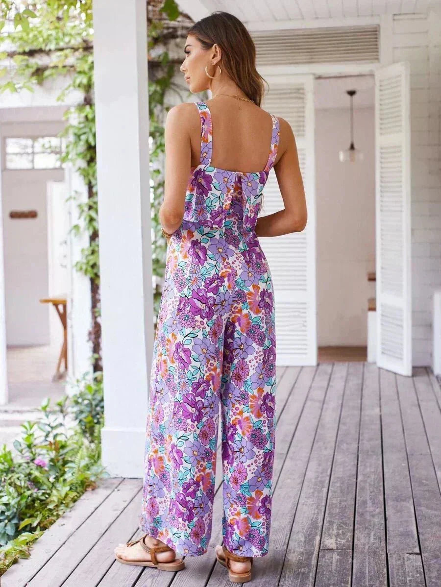 Purple floral wide-leg jumpsuit, back view, sleeveless square neckline, wide-leg pants
