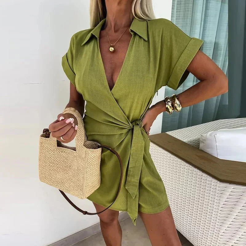 Green wrap playsuit with tie waist, short sleeves and V-neck front