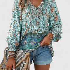 Teal floral peasant blouse with gathered neckline, dark embroidered border