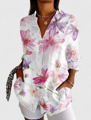 White blouse with pink and purple floral print, button-front, and long sleeves