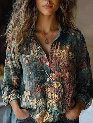 Dark teal floral and paisley button-up blouse with long sleeves and collar