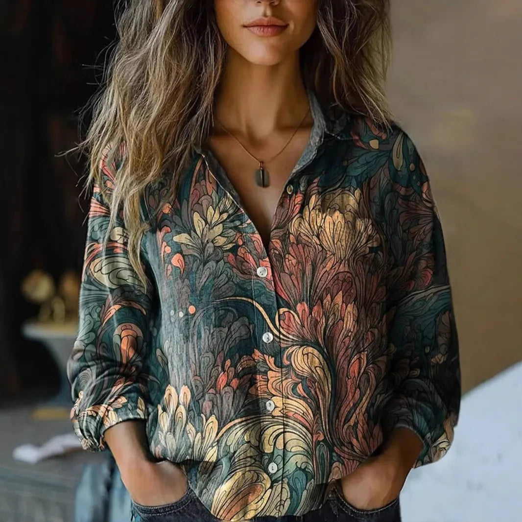 Dark teal floral and paisley button-up blouse with long sleeves and collar