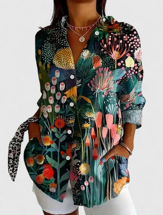 Dark floral print blouse with button-front, pointed collar, and long sleeves