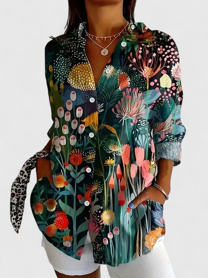 Dark floral print blouse with button-front, pointed collar, and long sleeves