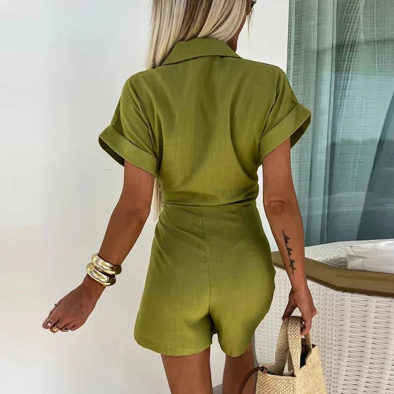 Olive green collared playsuit, back view with waist tie and short romper legs