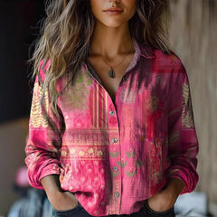 Pink-and-fuchsia patterned button-up blouse with long sleeves and collar