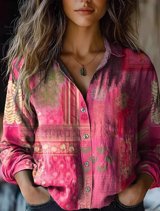 Pink-and-fuchsia patterned button-up blouse with long sleeves and collar
