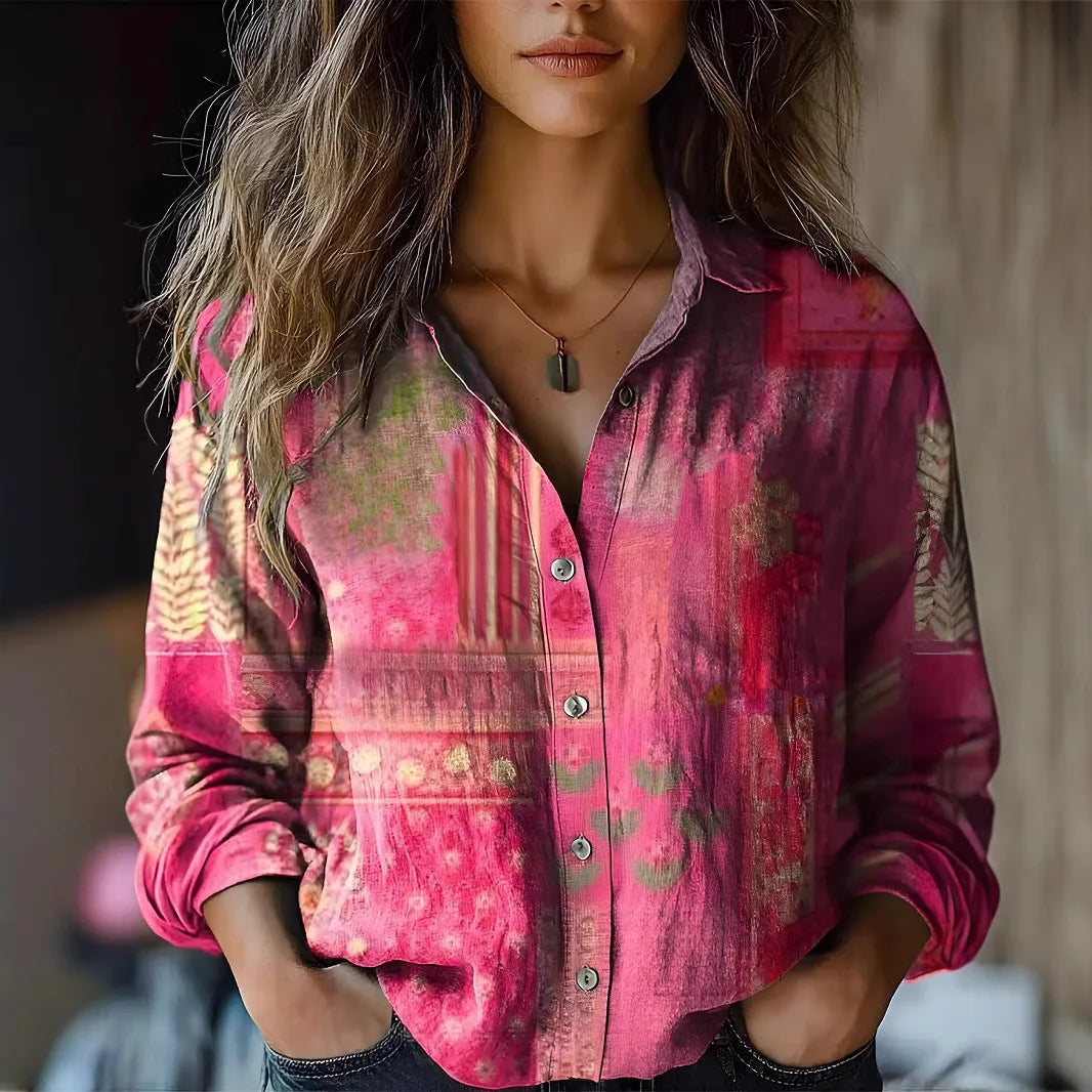 Pink-and-fuchsia patterned button-up blouse with long sleeves and collar