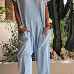 Light blue V-neck short-sleeve jumpsuit with patch pockets and loose tapered legs