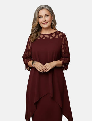 Red wine dress with sheer mesh sleeves, geometric cutout yoke, and flowing drape hem