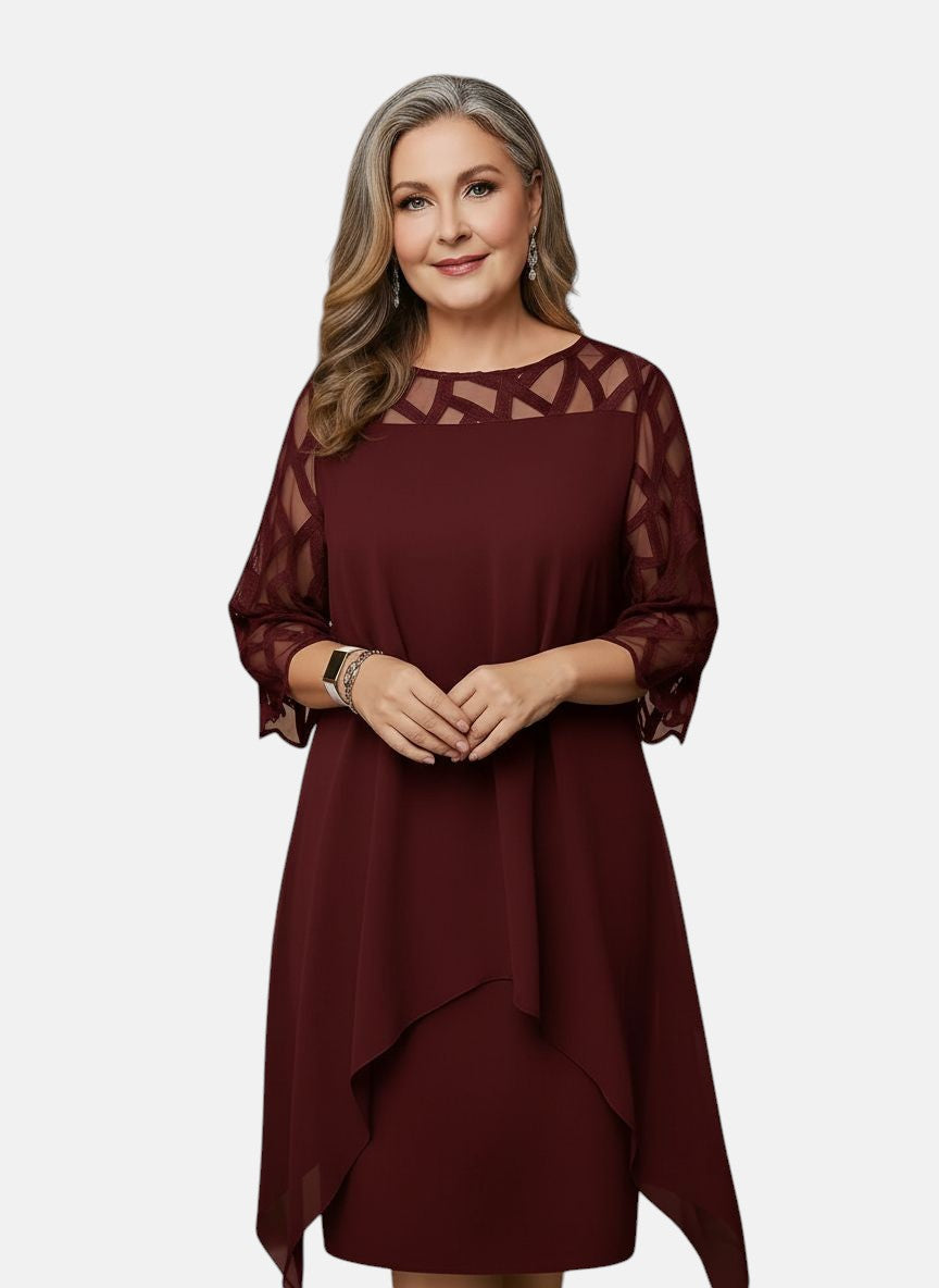 Red wine dress with sheer mesh sleeves, geometric cutout yoke, and flowing drape hem