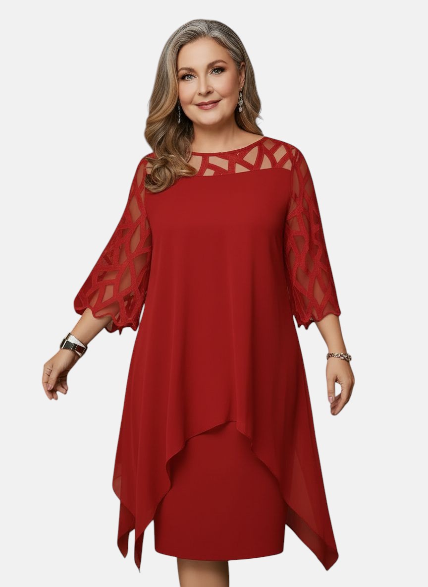 Red dress with sheer mesh sleeves, geometric cutout yoke, and layered asym hem
