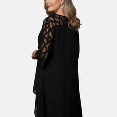 Black dress with mesh sleeves, geometric yoke, and asymmetric drape hem