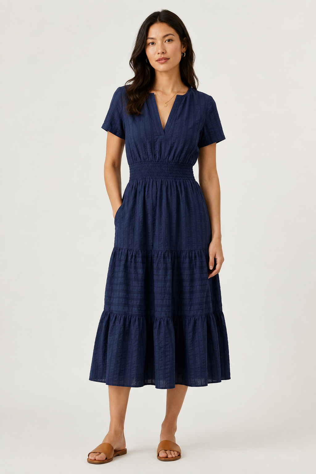 Blue tiered midi dress with short sleeves, V-neck and smocked waist