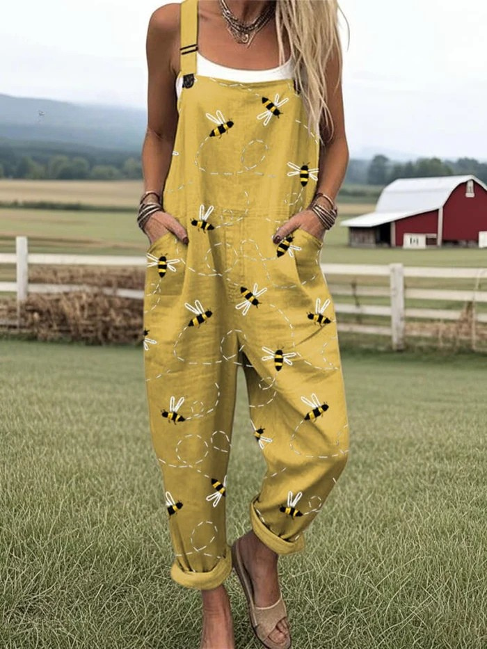 Yellow sleeveless jumpsuit with flying bee embroidery pattern, wide legs
