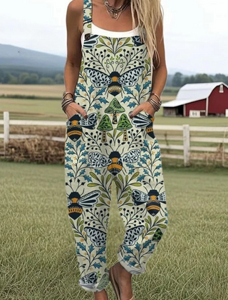 Blue sleeveless jumpsuit with floral vines and bee motif, wide legs