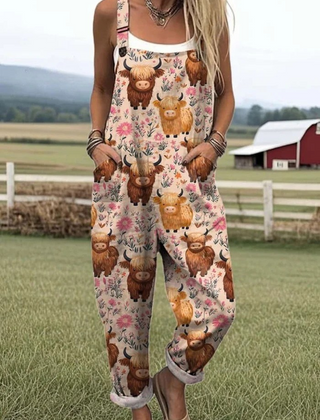 Pink sleeveless jumpsuit with woodland animal and flower print, wide legs