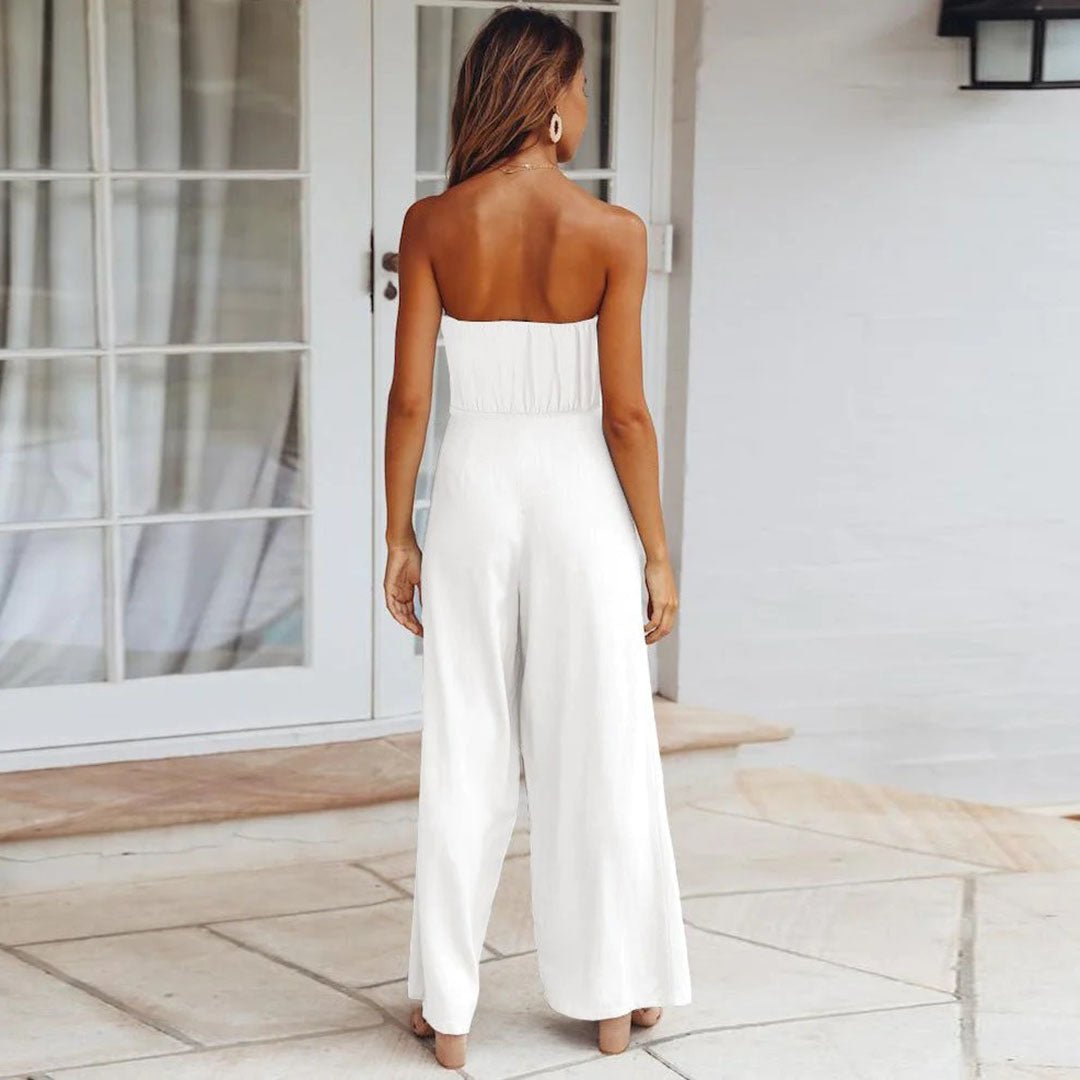 White strapless jumpsuit with smocked back and wide-leg trousers