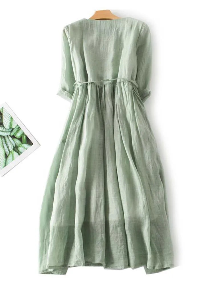 Women’s green short-sleeve lace-up waist dress with tiered gathered skirt