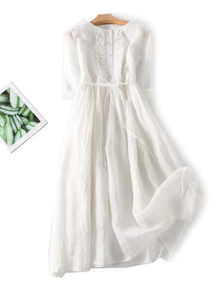 Women’s white lace-up waist dress with round neck and ruffled front panel