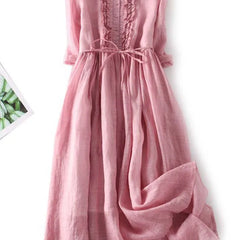 Women’s pink lace-up waist dress with round back and ruffled yoke detail