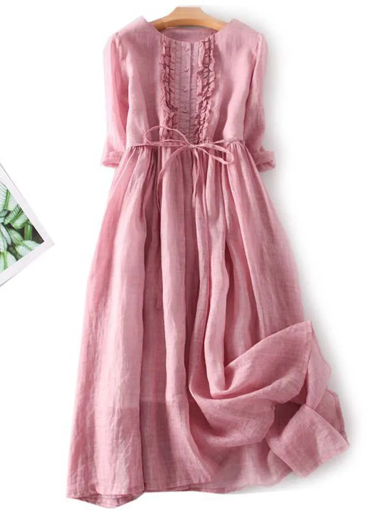 Women’s pink lace-up waist dress with round back and ruffled yoke detail