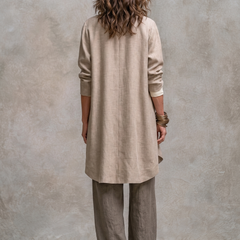 Back view: open beige long cardigan over cream camisole and gray wide-leg palazzo pants