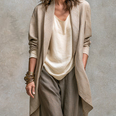 Three-piece palazzo set with textured open cardigan over a cream camisole and gray pants