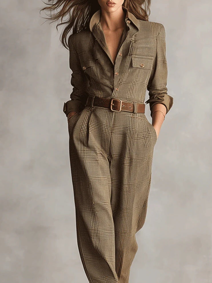 Brown plaid belted jumpsuit with buttoned front, shirt collar, and chest pocket