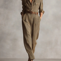 Brown plaid long-sleeve jumpsuit with belt and buttoned collared neckline