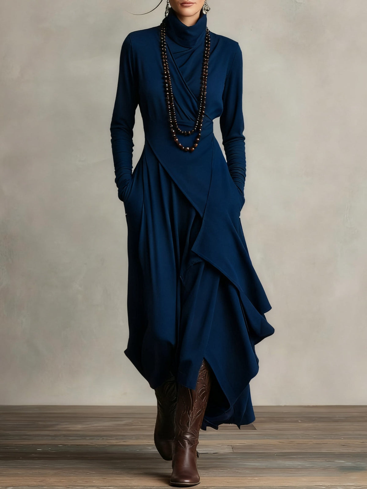 Navy blue long-sleeve maxi dress with high neck and layered wrap skirt