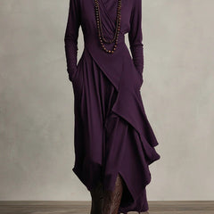 Purple long-sleeve maxi dress with high neck and draped asymmetrical wrap skirt