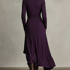 Purple long-sleeve maxi dress shown from back, draped wrap skirt