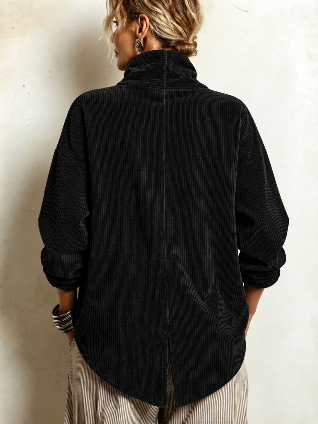 Black corduroy button-up top, back view with mock neck and center vent.
